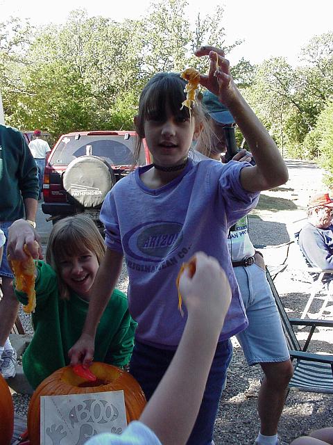 Christine Albrecht showing us pumpkin guts.JPG